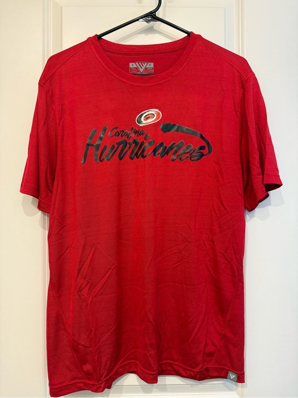 Carolina Hurricanes short sleeve shirt, size medium
